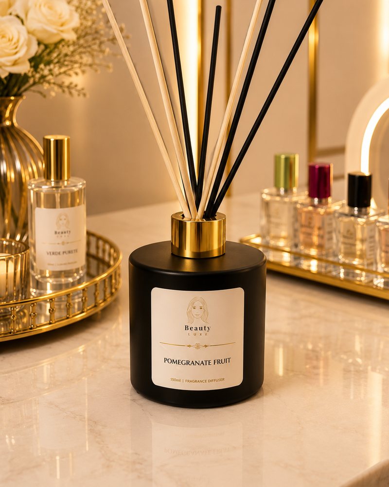 Beauty Luxe Pomegranate Fruit 150ml fragrance diffuser in a black vessel with mixed reeds.