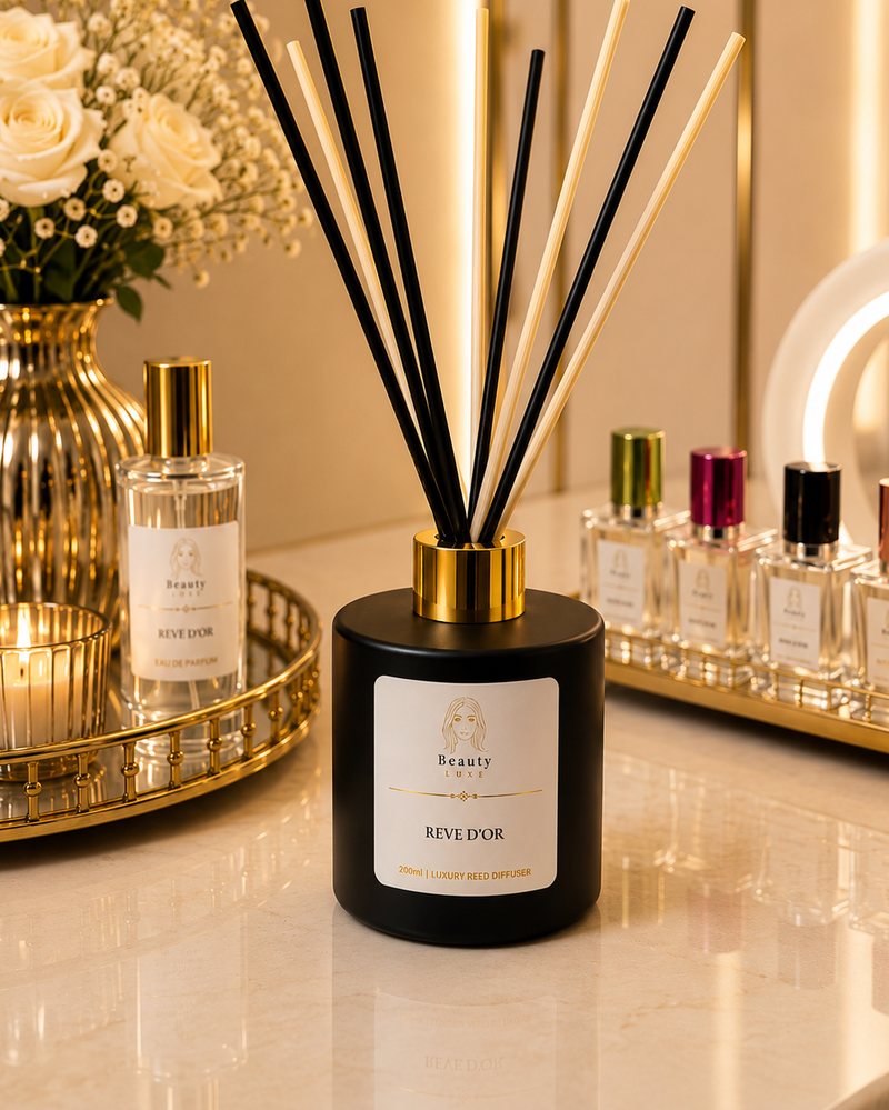 Beauty Luxe Rêve d'Or 200ml luxury reed diffuser in a black vessel with mixed light and dark reeds.