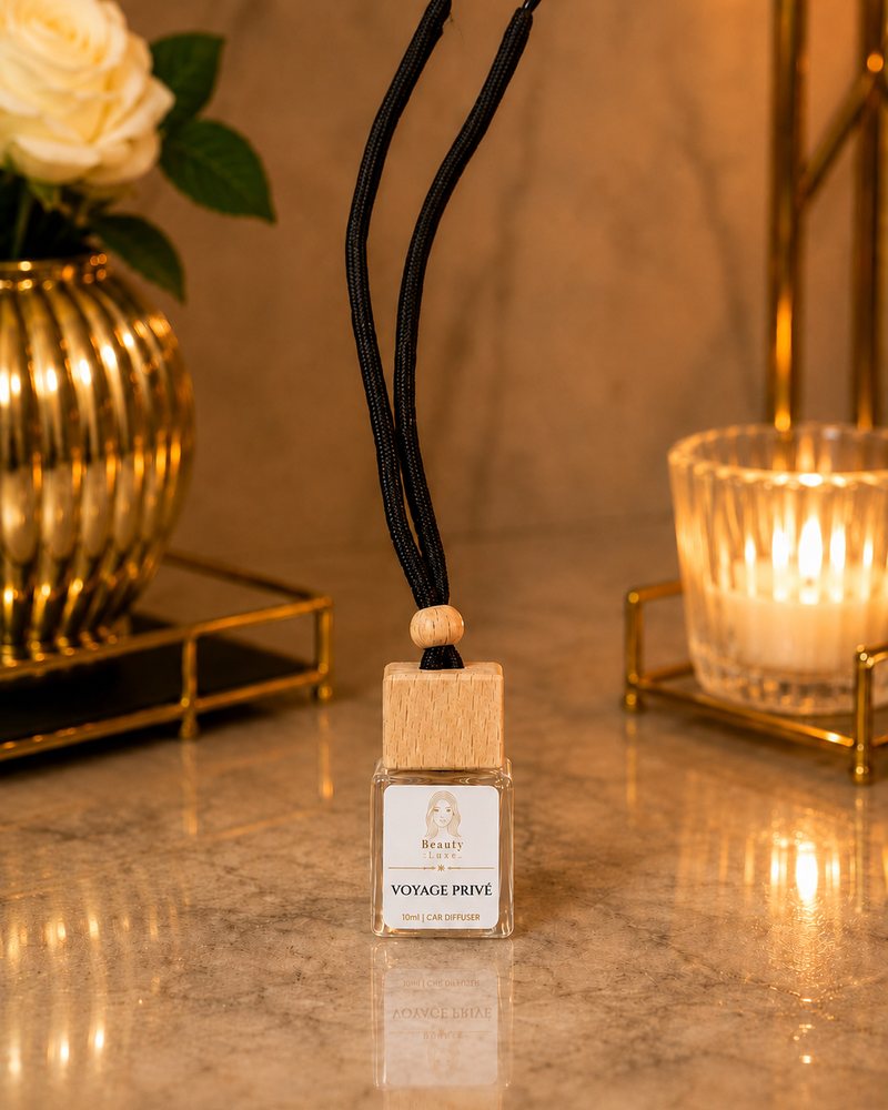 Beauty Luxe Voyage Privé 10ml car diffuser with a wooden cap and black cord.